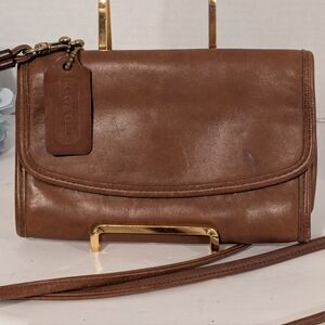 Coach Vintage Taylor leather flap shoulder bag in brown. 